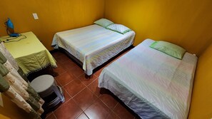 Double Room | Down comforters, Select Comfort beds, individually decorated, free WiFi - Posada Woochooch (San Juan La Laguna)