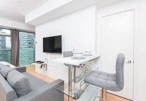 55-inch LED TV with satellite channels, TV - Front St - Entertainment District (Toronto)