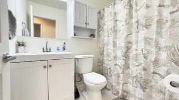 Hair dryer, towels, soap, shampoo