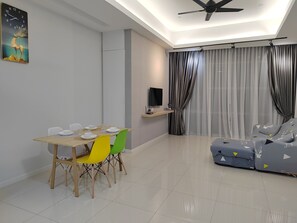 Apartment | Living area | 43-inch Smart TV with digital channels - Executive Azure Next to New World Hotel (Petaling Jaya)