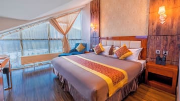 Deluxe Double Room | Minibar, desk, laptop workspace, blackout drapes