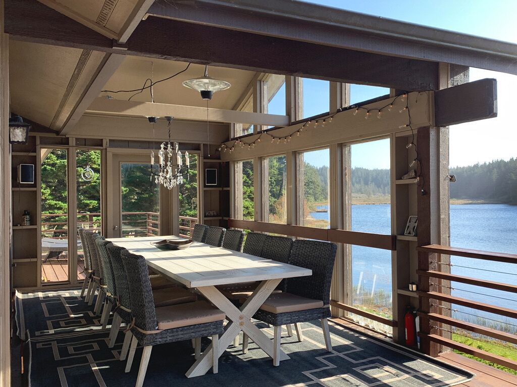 Luxurious Getaway on the Lake with hot tub, pool table, boat dock, covered porch