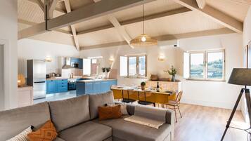 Panoramic Apartment | Living area | 43-inch Smart TV with satellite channels, TV