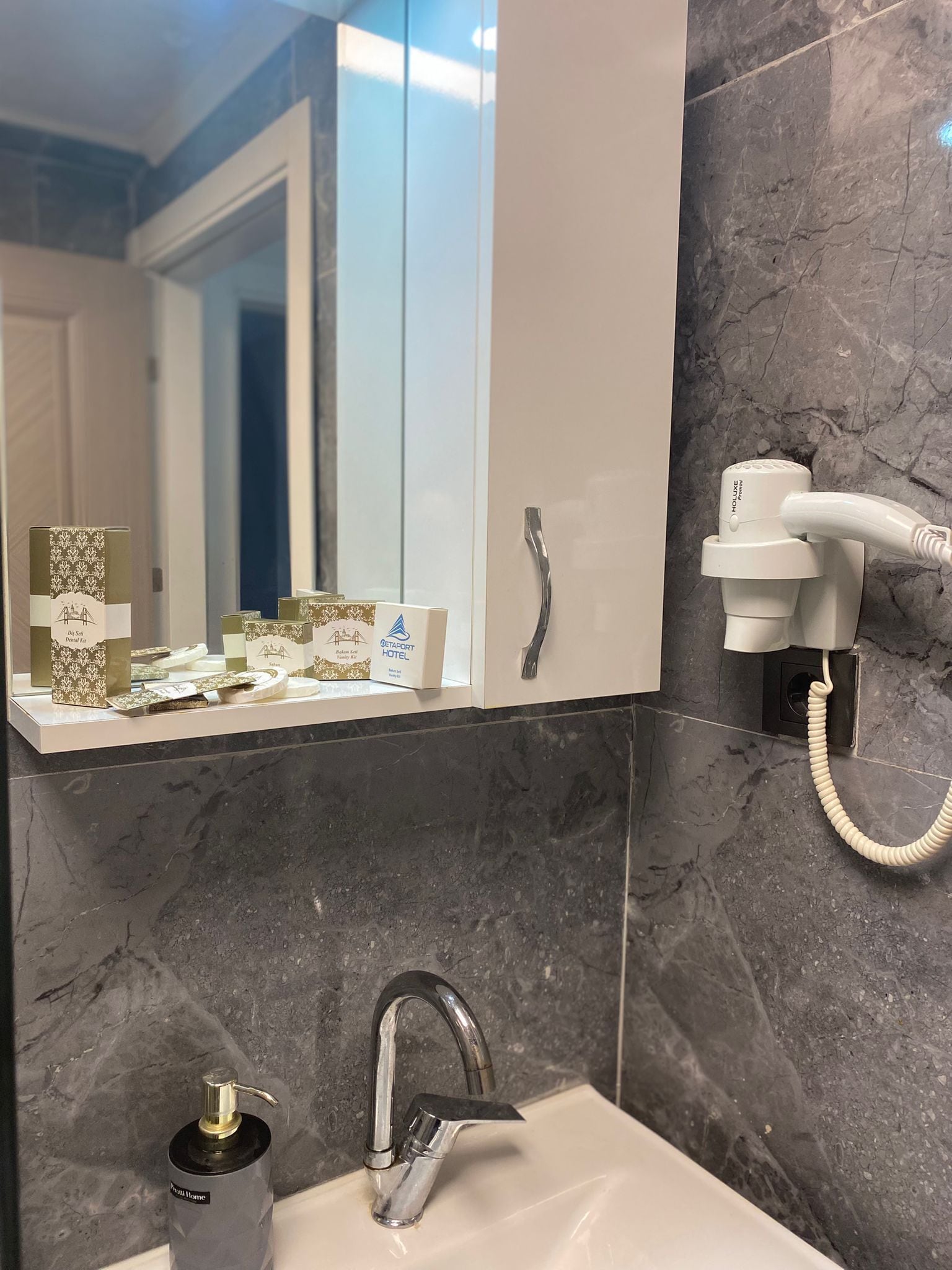 Hair dryer, bathrobes, towels, soap