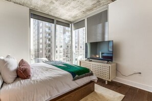 1 bedroom, desk, iron/ironing board, travel cot