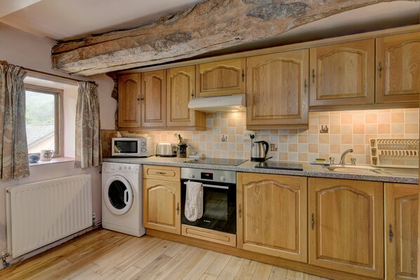 Microones, forn i trona 