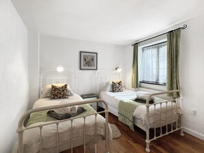 2 habitaciones, tabla de planchar con plancha y acceso a internet 