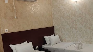 Deluxe Quadruple Room, 1 Bedroom, Smoking, Marina View | Premium bedding, down comforters, desk, free WiFi