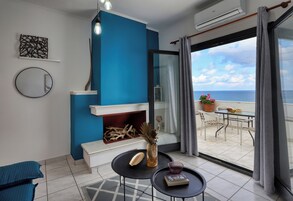 Comfort Apartment, Sea View, Beachside | Living area | Flat-screen TV