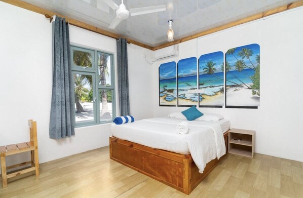 Deluxe Room | 1 bedroom, in-room safe, free WiFi