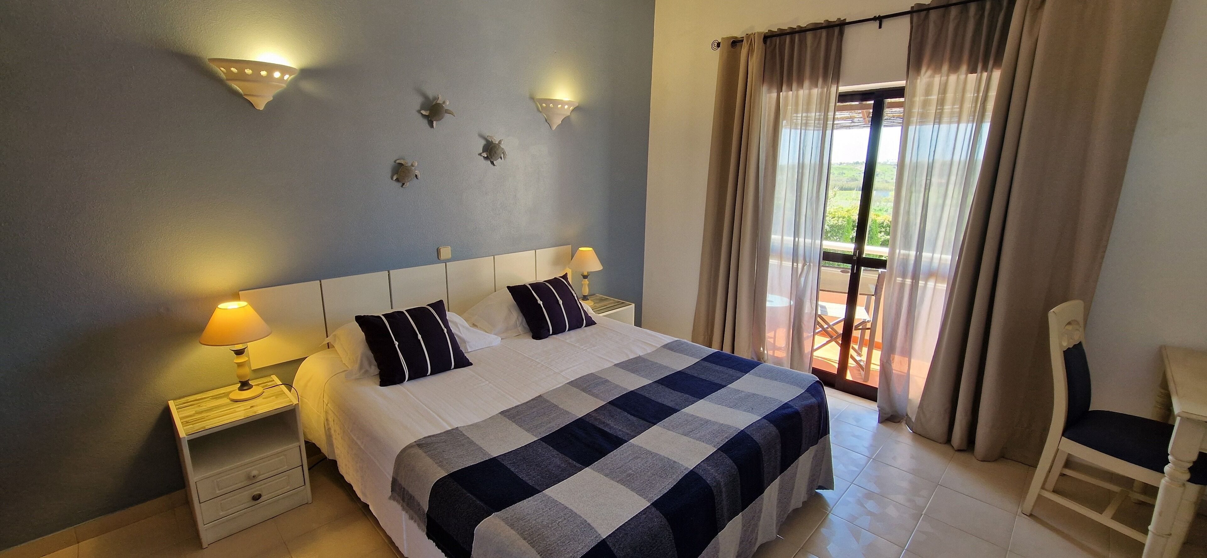 Double Room, Pool View | Hypo-allergenic bedding, in-room safe, free WiFi, bed sheets
