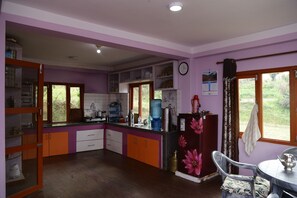 Fridge, cookware/dishes/utensils, dining tables