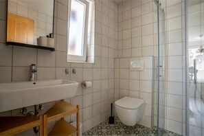 Hair dryer, towels, soap, toilet paper