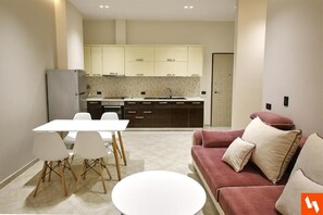 Standard Apartment | Living area | 43-inch Smart TV with satellite channels, TV - Easy Stay Beach Front Residences (Golem)