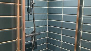 Shower, towels, soap, shampoo