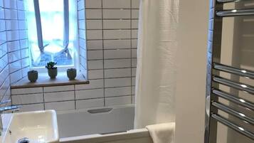 Shower, free toiletries, hair dryer, towels