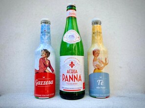 Wine bottles on display, showcasing Acqua Panna Toscana.