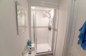 Bathtub, hair dryer, towels