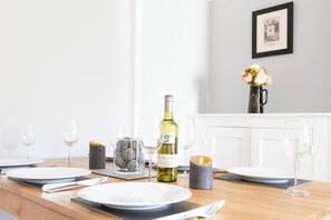 Dining - Jubilee Cottage is a comfortable three-bedroom house featuring a sunny garden and private parking. (Whitstable)