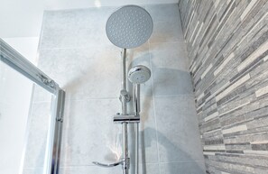 Bathtub, hair dryer, towels