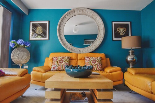 High Tide is a modern three-bedroom, boasting a luscious garden and convenient off-street parking.