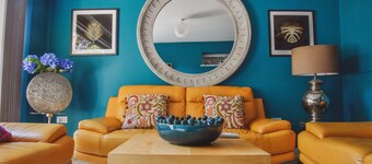 High Tide is a modern three-bedroom, boasting a luscious garden and convenient off-street parking.