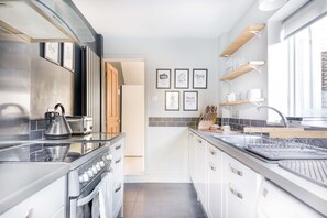 Fridge, microwave, oven, stovetop - Fig Tree Cottage is a cosy, two bedroom house, situated in the relaxing seaside town of Whitstable. (Whitstable)