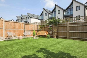 Property grounds - Cedar House is a modern three-bedroom townhouse, sleeping up to six guests and offering parking. (Whitstable)