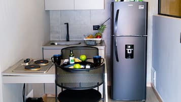 Basic Double Room | Private kitchen | Full-sized fridge, microwave, freezer