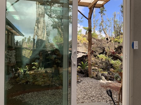 Interior. Exotic garden cottage at amazing volcanic fissure