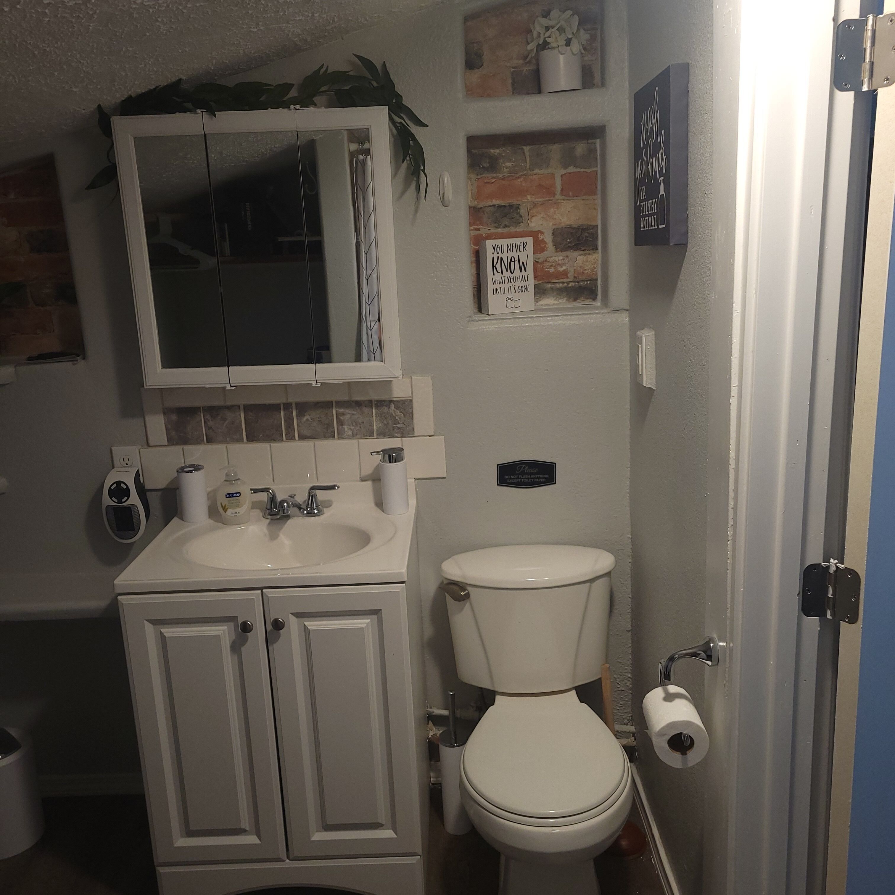 Shower, rainfall showerhead, hair dryer, towels