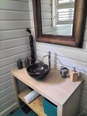 Shower, towels, soap, toilet paper