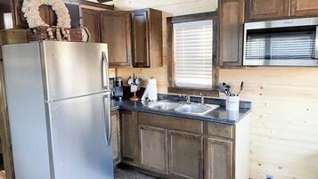 Fridge, microwave, coffee/tea maker, toaster