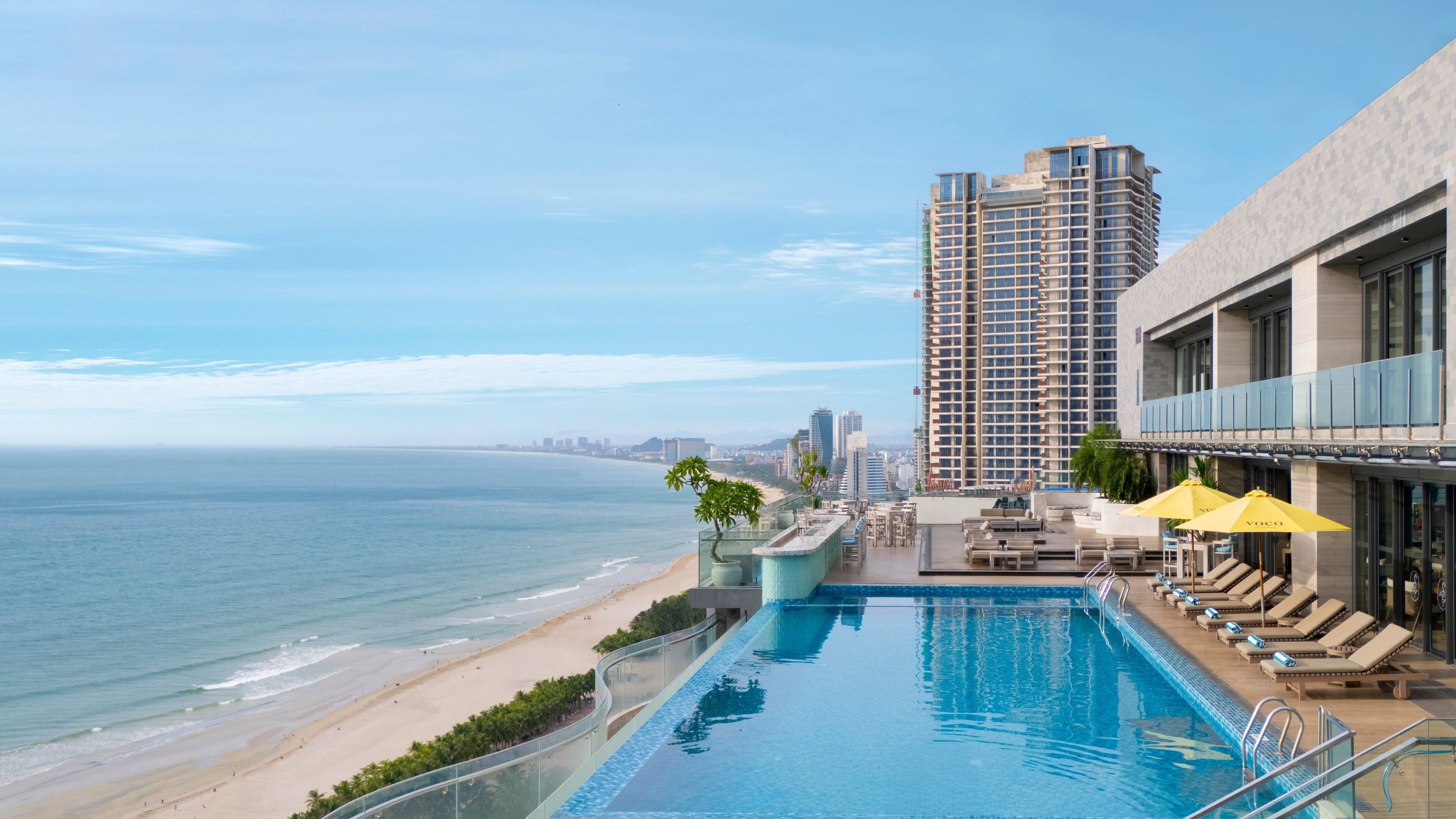 Outdoor pool, open 7:00 AM to 8:00 PM, pool umbrellas, sun loungers