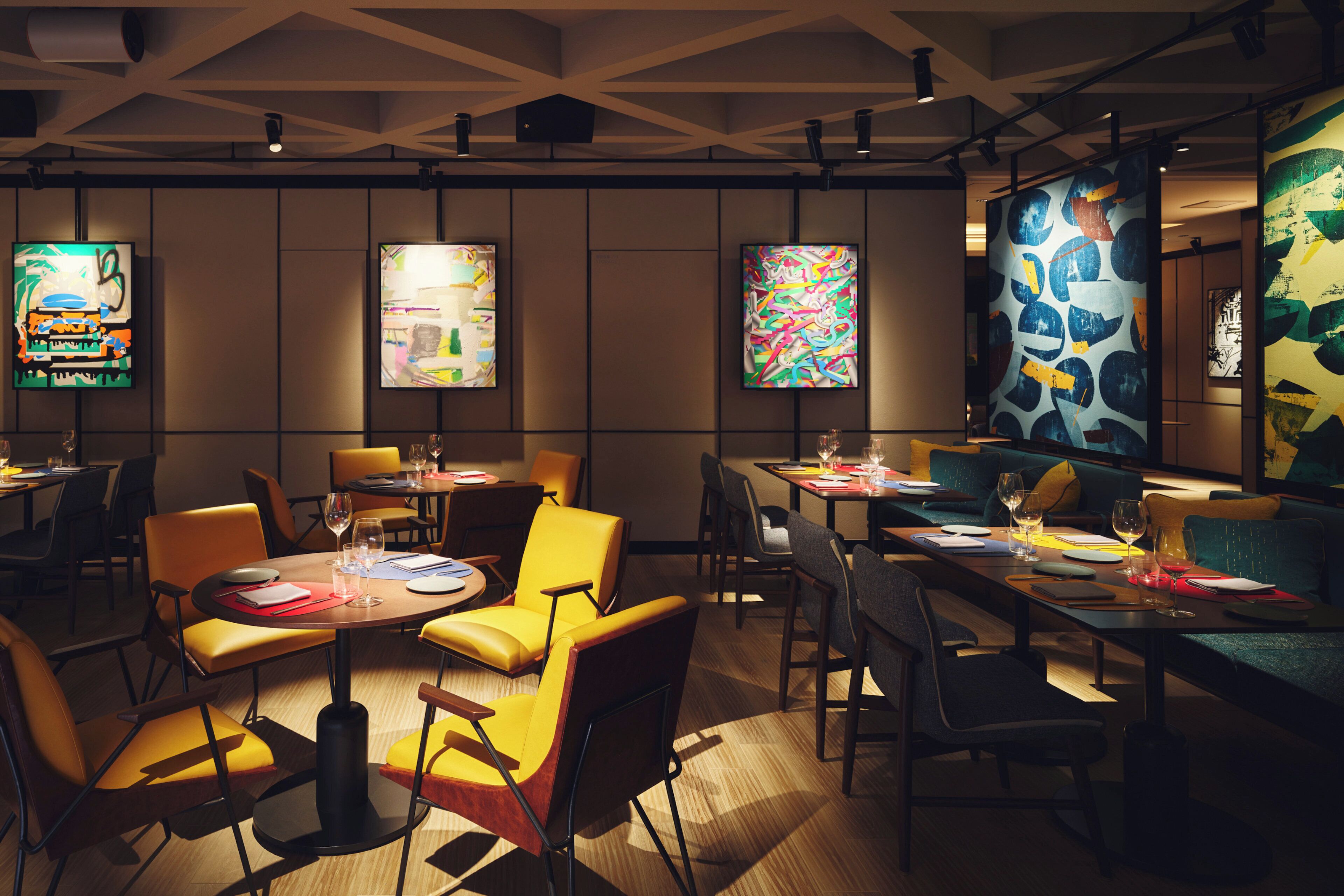 A modern restaurant with round tables, yellow chairs, and abstract art on the walls.