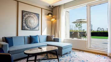 Suite, 1 Bedroom, Balcony | Living area | 43-inch LED TV with digital channels, TV