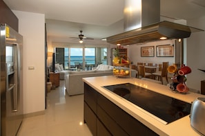 Luxury Apartment | Private kitchen | Coffee/tea maker, toaster, cookware/dishes/utensils, cleaning supplies