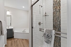 Shower, jetted tub, hair dryer, towels