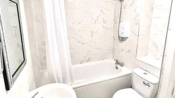 Hair dryer, towels, soap, shampoo