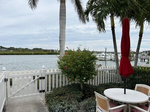 Outdoor dining - Waterfront corner unit, private patio, first floor (Indian Shores)