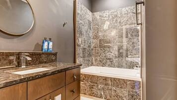 Shower, hair dryer, towels, shampoo