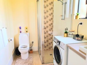 Shower, hair dryer, towels, soap