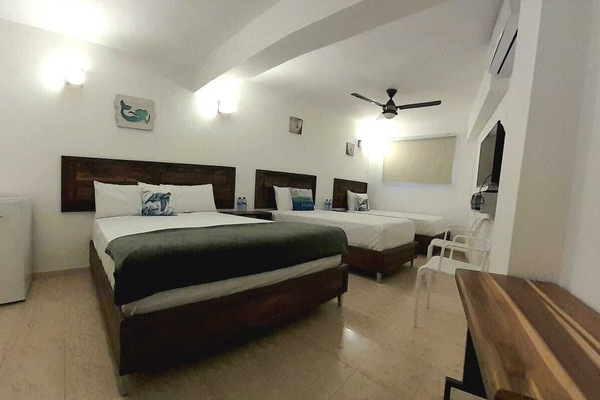 Family Triple Room | Pillowtop beds, free minibar, individually decorated