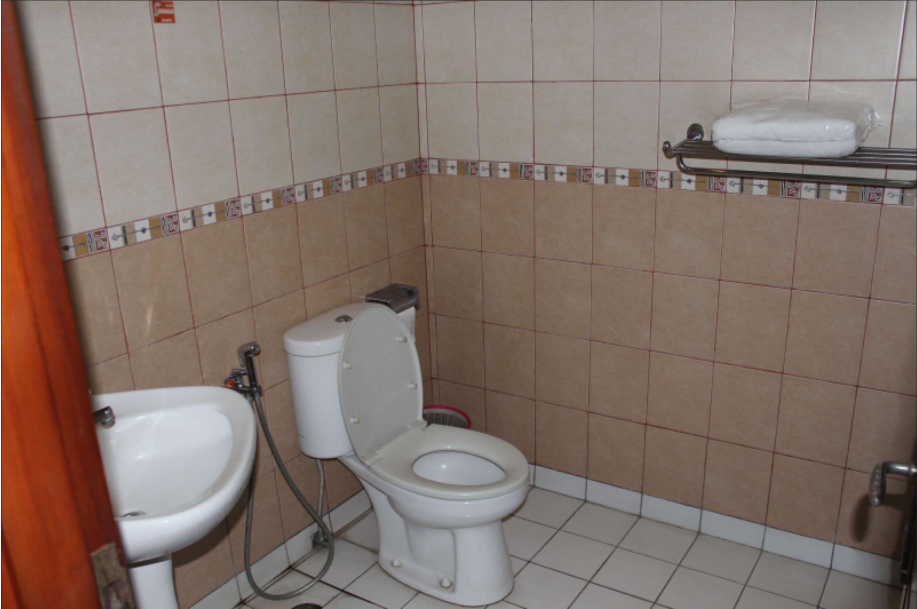 standard room | bathroom | slippers, towels, soap, shampoo