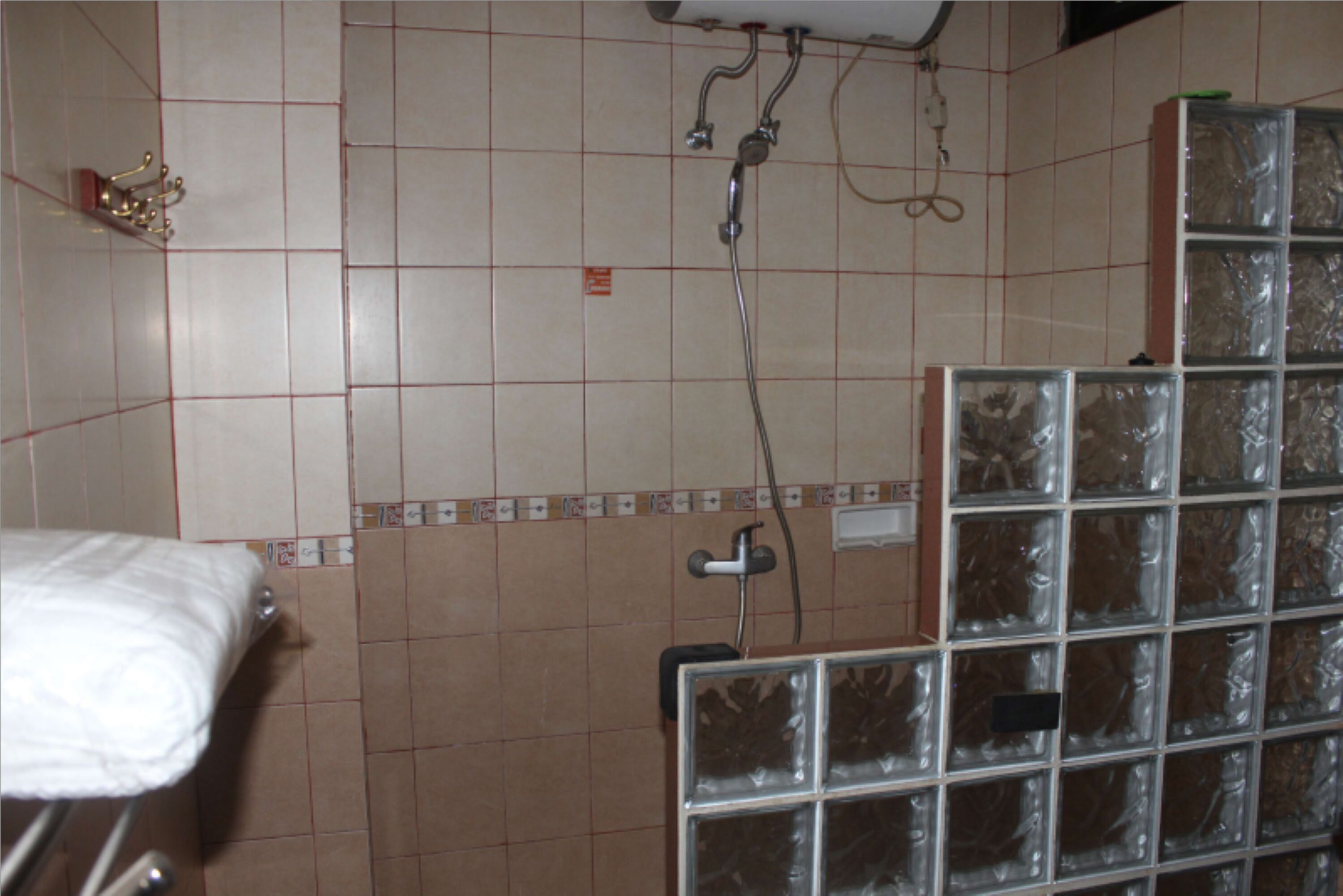 standard room | bathroom | slippers, towels, soap, shampoo