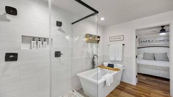 Shower, eco-friendly toiletries, hair dryer, towels