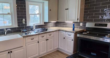 French country home on 10 acres, near Int. airport