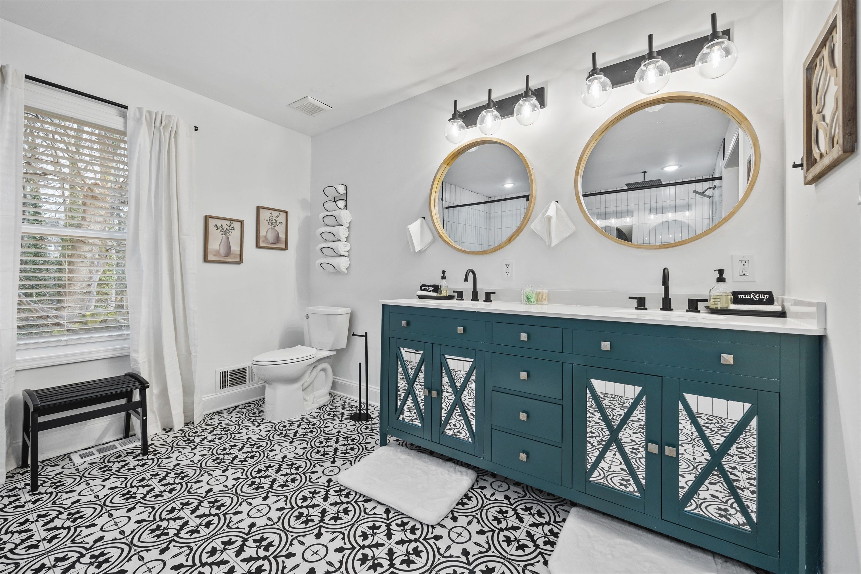 Luxurious Primary In-Suite (Bathroom) with dual vanities, an oversized soaking tub, and a waterfall shower.