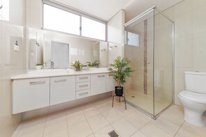 Shower, hair dryer, towels, soap