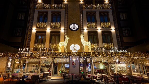 A hotel with a prominent sign reading "KATE HOTEL" and "CAFE RESTAURANT" below. - Kate Hotel Special Class & Spa (Istanbul)
